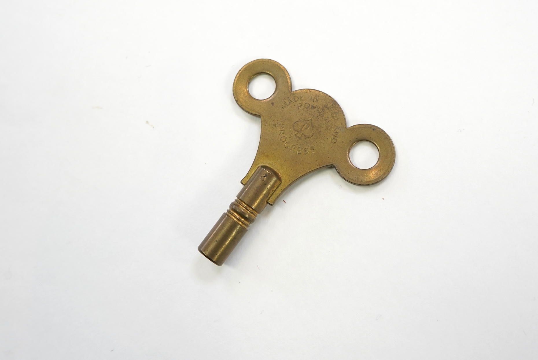 A mid 20th century brass skeleton ‘Cathedral’ clock